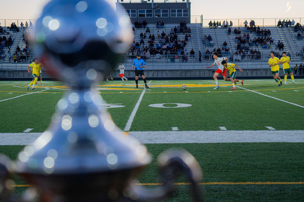 Quincy High School soccer action photo